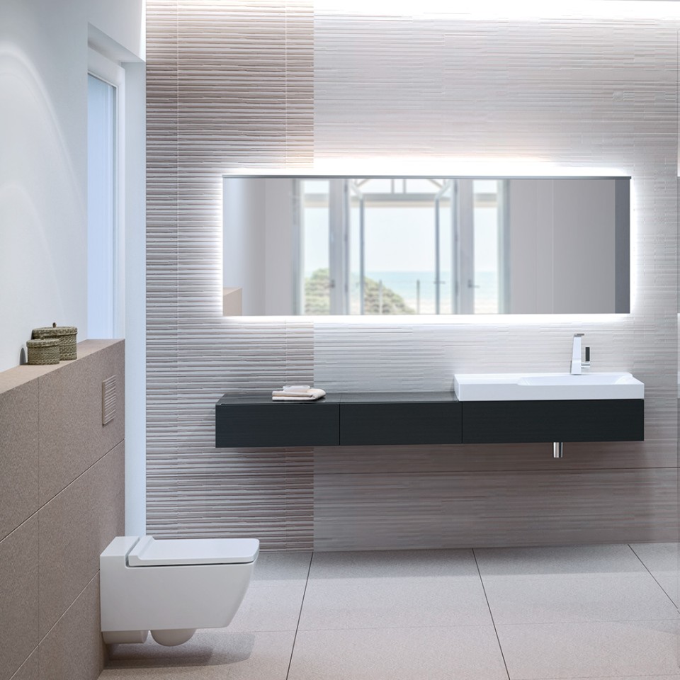 Łazienka z bezkrawędziową toaletą Geberit Xeno², przyciskiem Sigma70 i umywalką