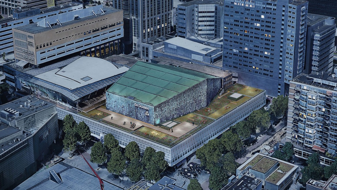 Płaski dach ma powierzchnię ponad 2500 m² i biegnie wokół miedzianego dachu dużej sali koncertowej (© Plotvis i Kraaijvanger Architecten). Płaski dach ma powierzchnię ponad 2500 m² i biegnie wokół miedzianego dachu dużej sali koncertowej (© Plotvis i Kraaijvanger Architecten).